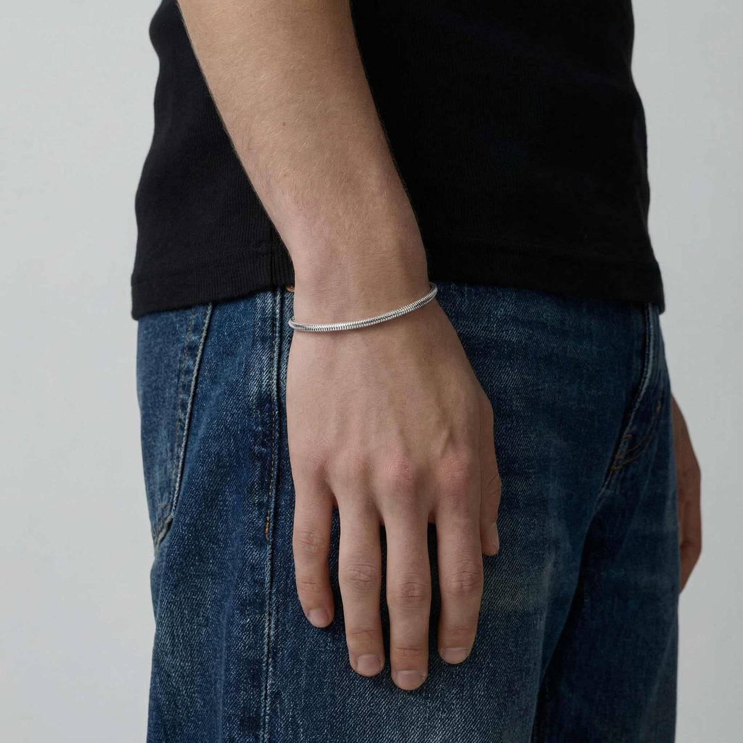 Unity silver bracelet worn on wrist - 925 sterling silver snake chain men women | Wild Youth