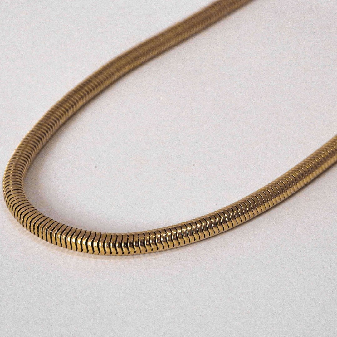 Unity gold necklace worn close-up - 19k gold snake chain men women | Wild Youth