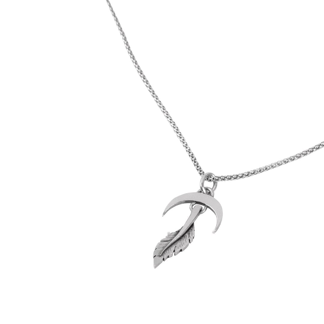 Feather sterling silver necklace flat lay - handmade Portugal Wild Youth | Wild Youth