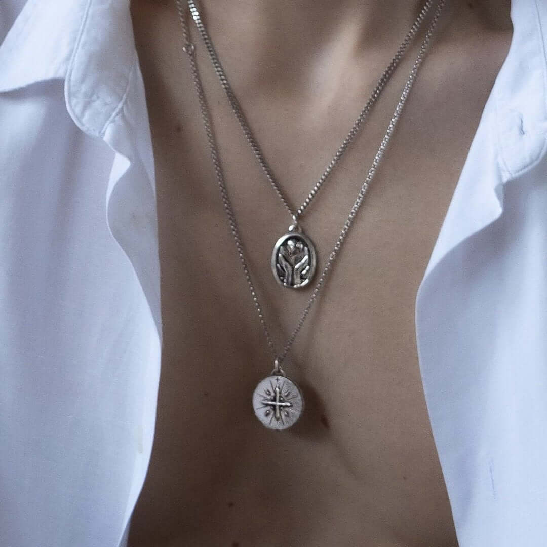 The World Is Yours silver necklace worn close-up - 925 sterling silver pendant men women | Wild Youth