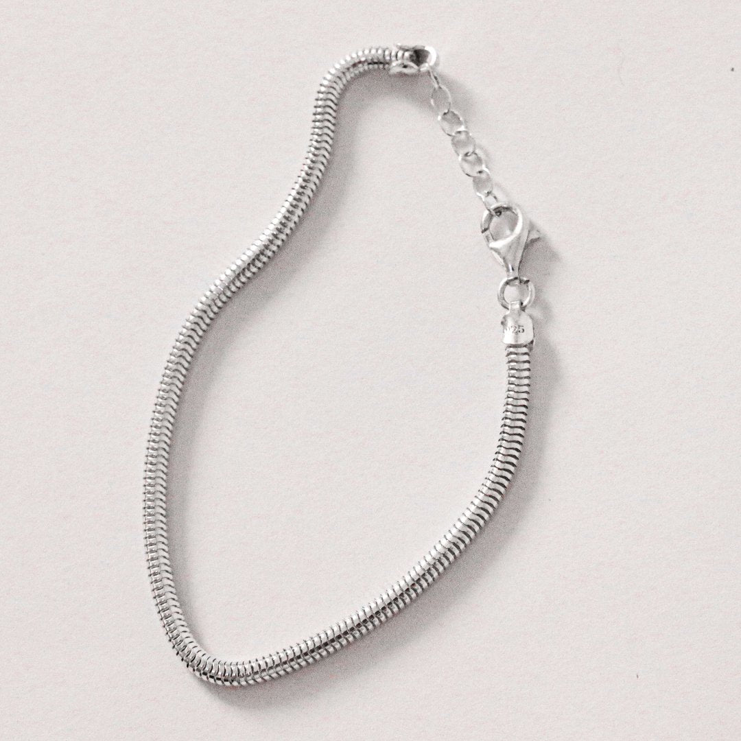 Unity sterling silver bracelet flat lay - layering jewellery Wild Youth | Wild Youth